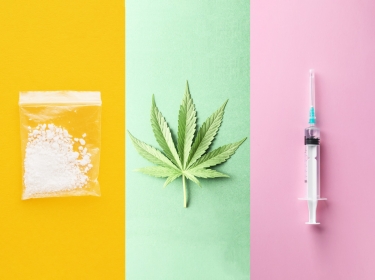 Cocaine, cannabis leaf, and syringe, photos by Bits and Splits, underworld, and Leonid/Adobe Stock