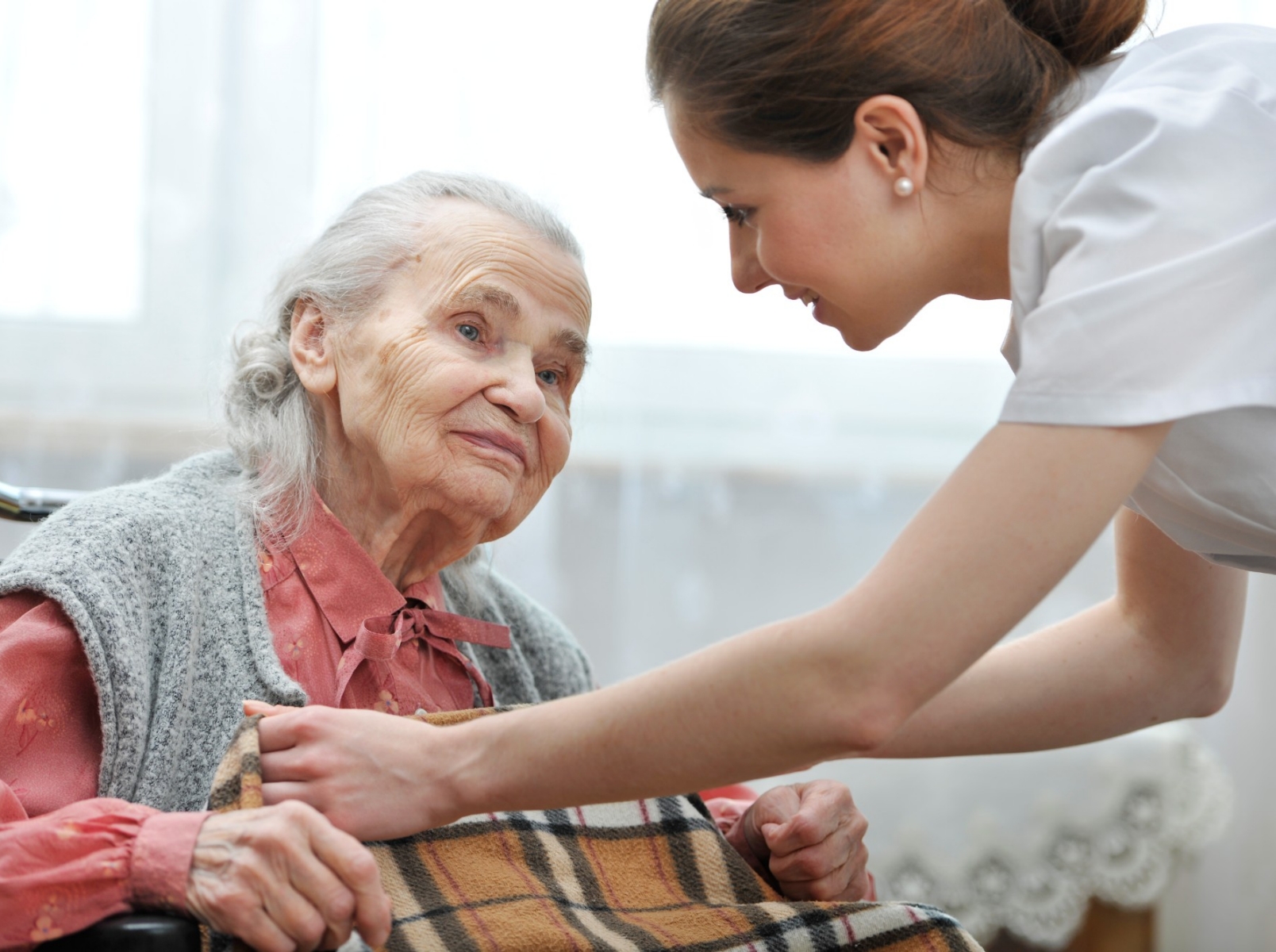 Petite woman plays with elder