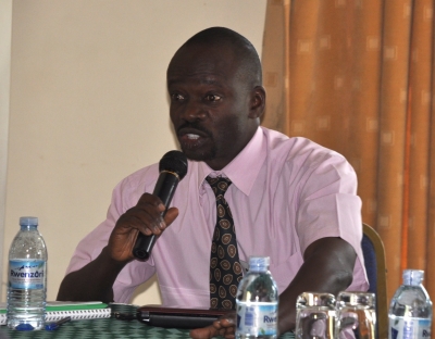 Yusuf Byaruhanga of Makerere University speaks at the Traditional Grains stakeholders meeting