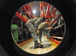 Airmen perform warehouse location checks at Whiteman Air Force Base, Mo., June 25, 2013