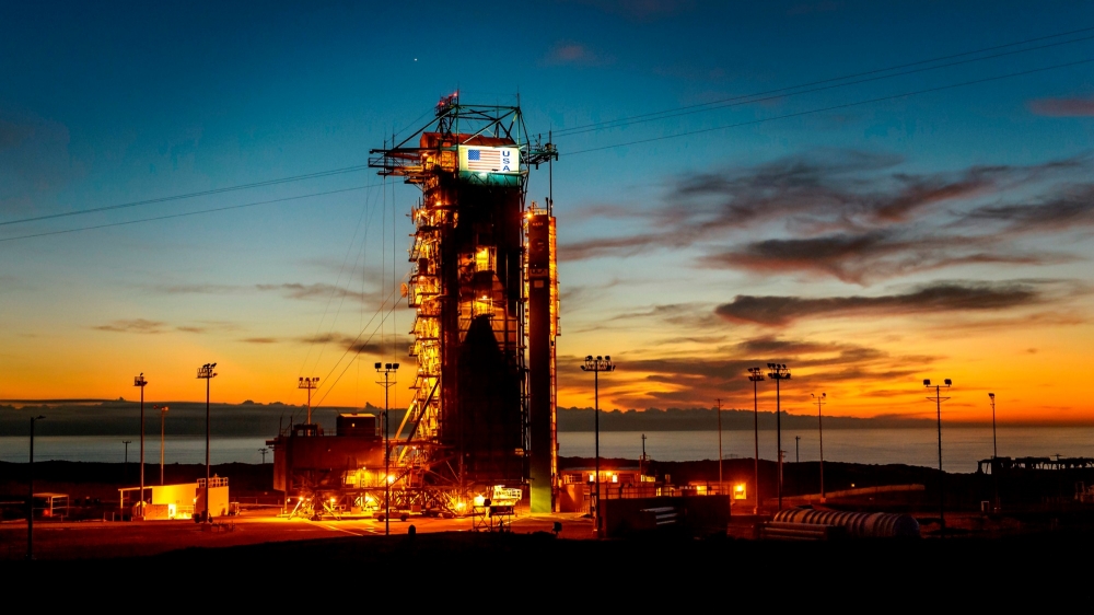 The sun sets behind Space Launch Complex 2 at Vandenberg Air Force Base, California