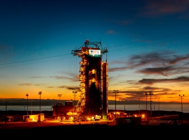 The sun sets behind Space Launch Complex 2 at Vandenberg Air Force Base, California