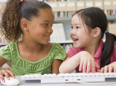 kindergarten girls using computer
