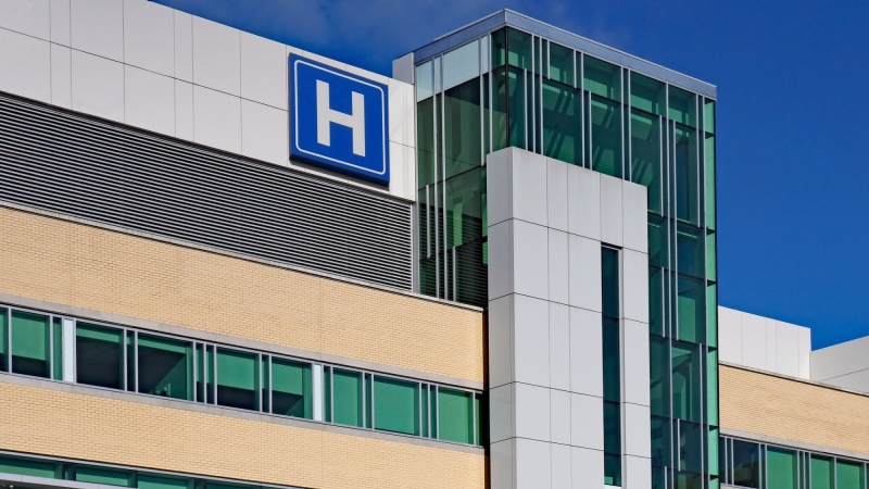 Modern hospital facade, photo by peterspiro/Getty Images