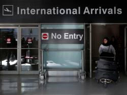 An international traveler arrives after U.S. President Donald Trump's executive order travel ban at Logan Airport in Boston, Massachusetts, January 30, 2017