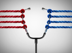 Opposing red and blue ropes pulling on a stethoscope