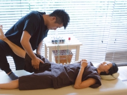Patient receiving chiropractic treatment