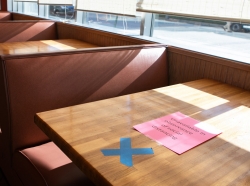 Tables are marked off at J. Christopher's restaurant that now offers dine-in service on April 27, 2020 in Decatur, Georgia.