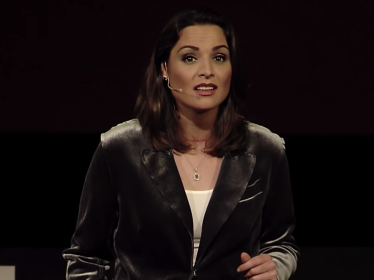RAND's Kathryn Bouskill speaks at a TEDxManhattanBeach event.