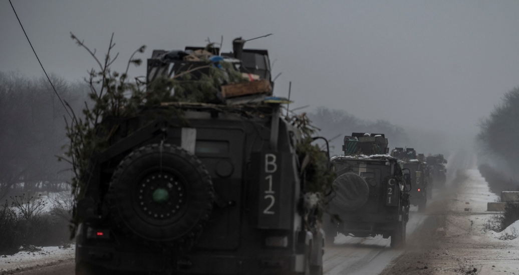 Armoured personnel carriers ride on a road near the frontline in Donetsk region, Ukraine, January 29, 2023