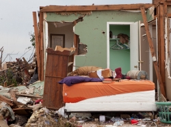 A destroyed home in Moore, OK, where an F5 tornado struck on May 20, 2013