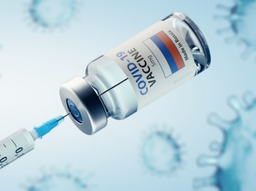 Russia COVID-19 vaccine and syringe, photo by Feydzhet Shabanov/Adobe Stock