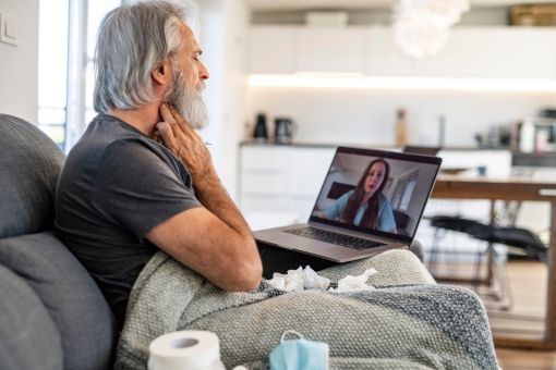 Man talking on telemedicine with doctor