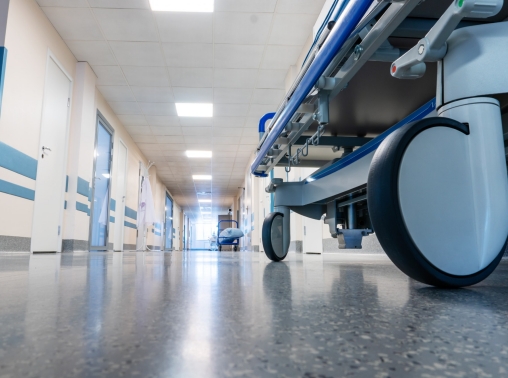 Medical bed on wheels in the hospital corridor