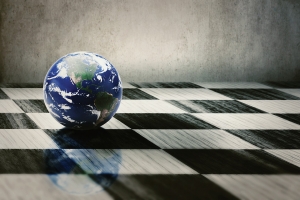 Small planet earth on a chess board