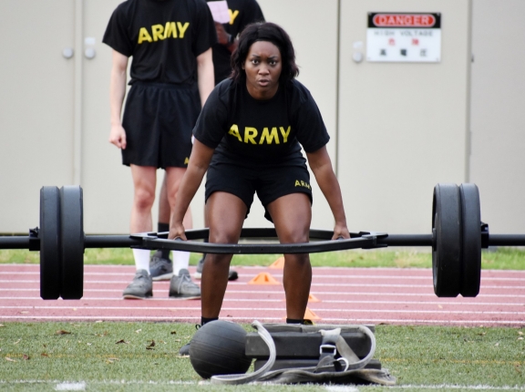 Staff Sgt. Sharonica White completes a deadlift repetition during the U.S. Army Japan 2020 Army Week's Army Combat Fitness Test Fitness Warrior Competition at Camp Zama, Japan, June 8, 2020, photo by Winifred Brown/U.S. Army