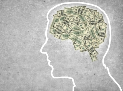 silhouette of brain made of money