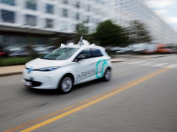 A self-driving car being developed by nuTonomy, a company creating software for autonomous vehicles, is guided down a street near their offices in Boston, Massachusetts, June 2, 2017