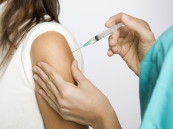 woman receiving immunization