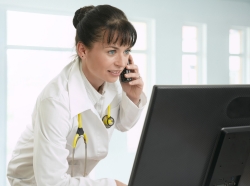 Doctor talking on telephone