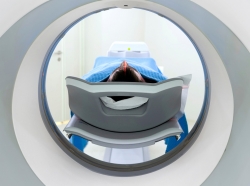 Man entering CT scan