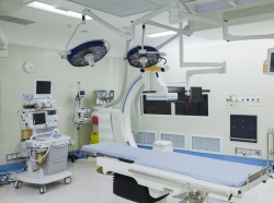 A hospital room with technological equipment