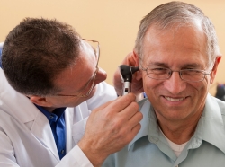 ear exam on senior patient