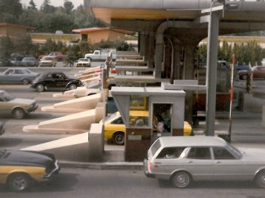 Cars go through Washington State toll booths