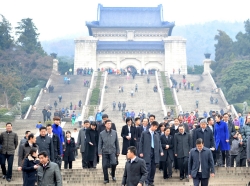 Taiwan's Mainland Affairs Minister Wang Yu-chi and his delegation leave after visiting the Sun Yat-sen mausoleum in Nanjing, Jiangsu province