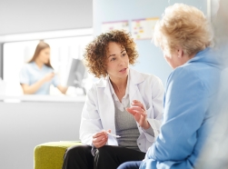 Female doctor discussing medication with a patient