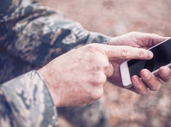 Soldier using a smartphone