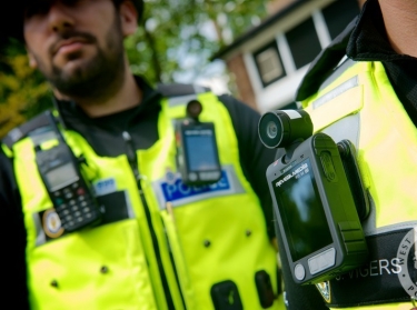 West Midlands Police officers trialling the use of body worn cameras.