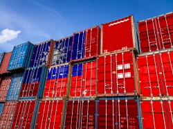 The national flag of Taiwan on a large number of metal containers for storing goods stacked in rows on top of each other. Conception of storage of goods by importers, exporters, photo by Sova Vitalij/AdobeStock
