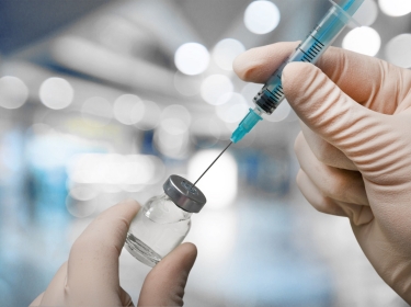 Vaccination in vial with syringe, by BillionPhotos.com/Adobe Stock