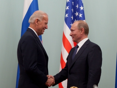 Then vice president Joseph Biden shakes hands with Russian prime minister Vladmir Putin in 2011