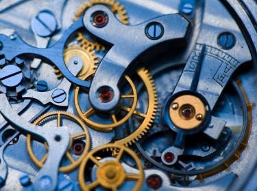 A close-up image of the inner workings of a clock. Photo by seraficus / Getty Images