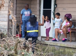 Members of a FEMA Disaster Survivor Assistance crew walk door to door to help residents of Houma apply for assistance after Hurricane Ida. Photo by Julie Joseph / FEMA