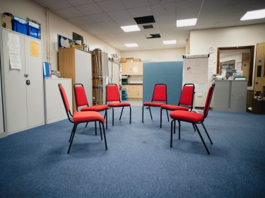 Rehabilitation center room prepared for a group therapy session, photo by SolStock/Getty Images
