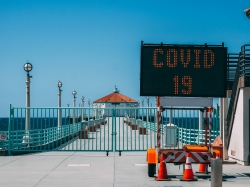 Manhattan beach pier closed for safety to avoid gathering of many people in one place because of COVID-19 pandemic, photo by martin-dm/Getty Images