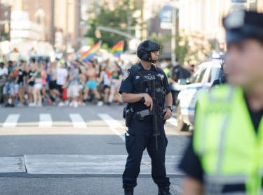 Counter-terrorism police stand guard on a cleared street at the annual Gay Pride Parade in Greenwich Village.
