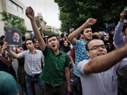 Supporters of reformist candidate Mir Hossein Mousavi, some wearing green, the color of the party, gather on the streets June 13, 2009, to protest the results of the Iranian presidential election in Tehran, Iran