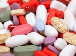 Assorted colorful pills and capsules of medication