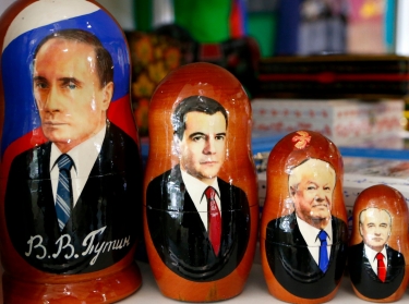 Russian nesting dolls bearing the faces of Russian leaders are displayed in a souvenir shop near Sochi, February 21, 2014