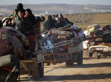 People fleeing violence in ISIS-controlled al-Bab, Syria arrive in the town's rebel-held outskirts, February 3, 2017