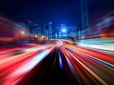Abstract motion speed light with night city background
