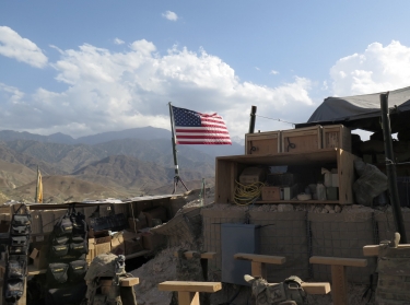 A U.S. flag is seen at a post in Deh Bala district, Nangarhar province, Afghanistan, after U.S. and Afghan forces cleared Islamic State fighters from the area, July 7, 2018