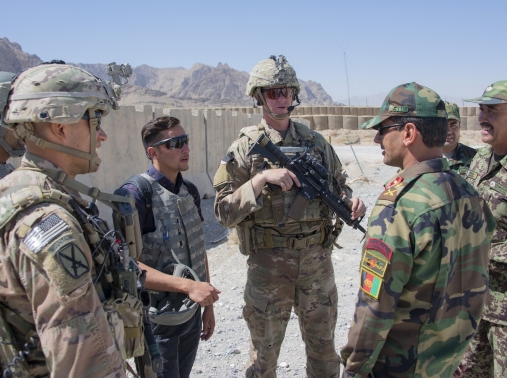 U.S. advisors speak with their Afghan National Army counterparts during a routine fly-to-advise mission at Forward Operating Base Altimur, Afghanistan, September 19, 2018