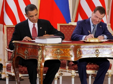 U.S. President Barack Obama and Russian President Dmitry Medvedev sign the New Strategic Arms Reduction Treaty at Prague Castle in the Czech Republic, April 8, 2010, photo by Jason Reed/Reuters