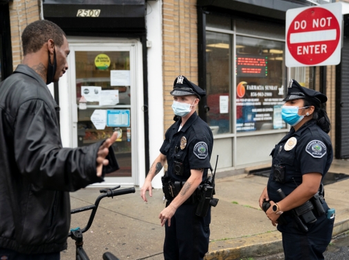 Officers patrol the streets of Camden, New Jersey, amid nationwide protests in the aftermath of the killing of George Floyd, June 11, 2020