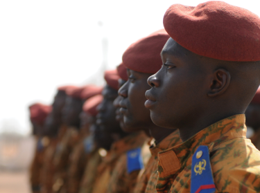 Soldiers of the Burkina Faso Army stand at attention at Camp Zagre, Burkina Faso, on February 27, 2017, at the opening of Flintlock 2017. The annual exercise, sponsored by the U.S. Africa Command, aims to strengthen security institutions, promote multilateral information sharing, and develop interoperability among partner nations in the Trans-Sahara region.